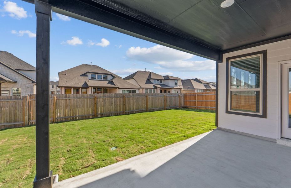 Exterior details and patio area of a home in Santa Rita Ranch, Liberty Hill (Image 29). Exterior details and patio area of a home in Santa Rita Ranch, Liberty Hill (Image 29).