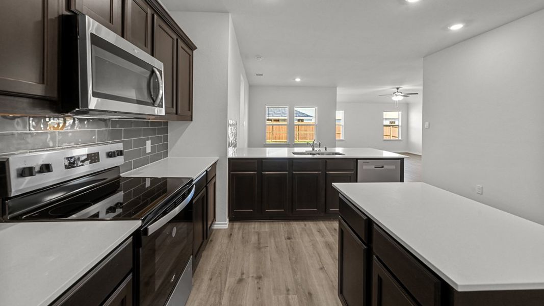 Furnished interior view inside a new home in Valor Farms, Royse City (Image 8).