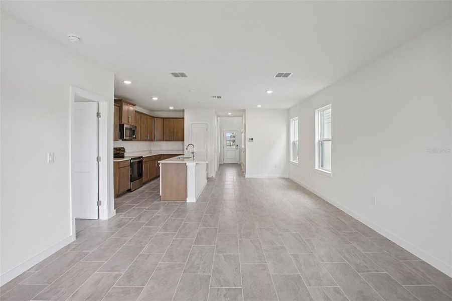 Spacious, unfurnished interior of a new home in Grasslands West, Lakeland (Image 35).