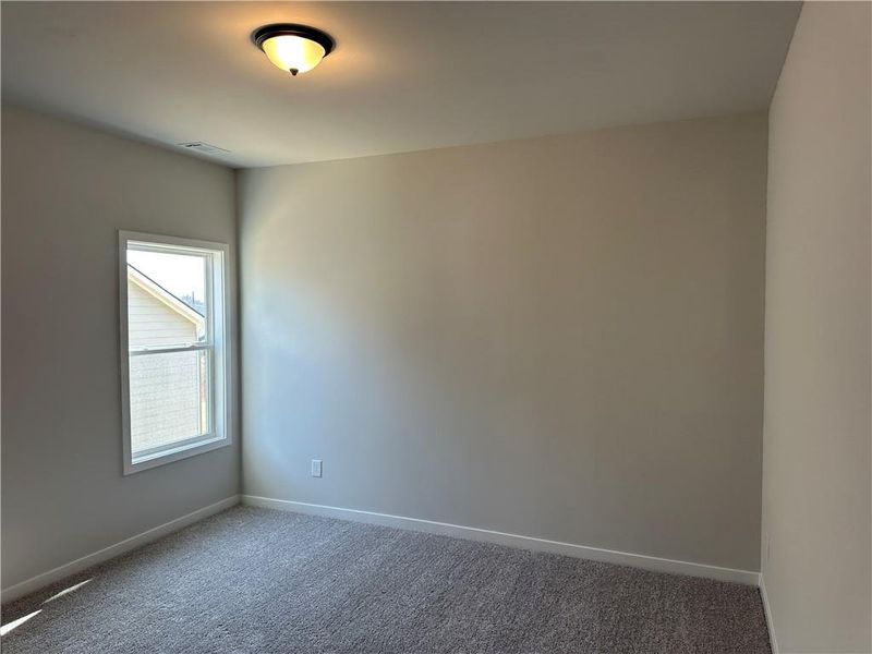 Spacious, unfurnished interior of a new home in Rosewood Lake Preserve, Hoschton (Image 23).