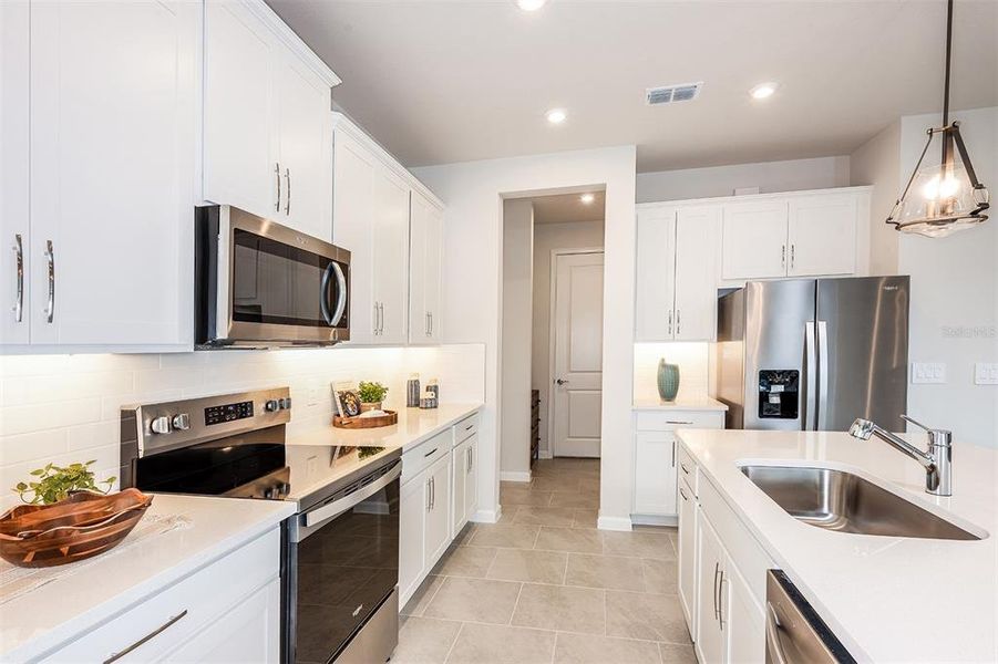 Furnished interior view inside a new home in Sanderling, Palmetto (Image 6).