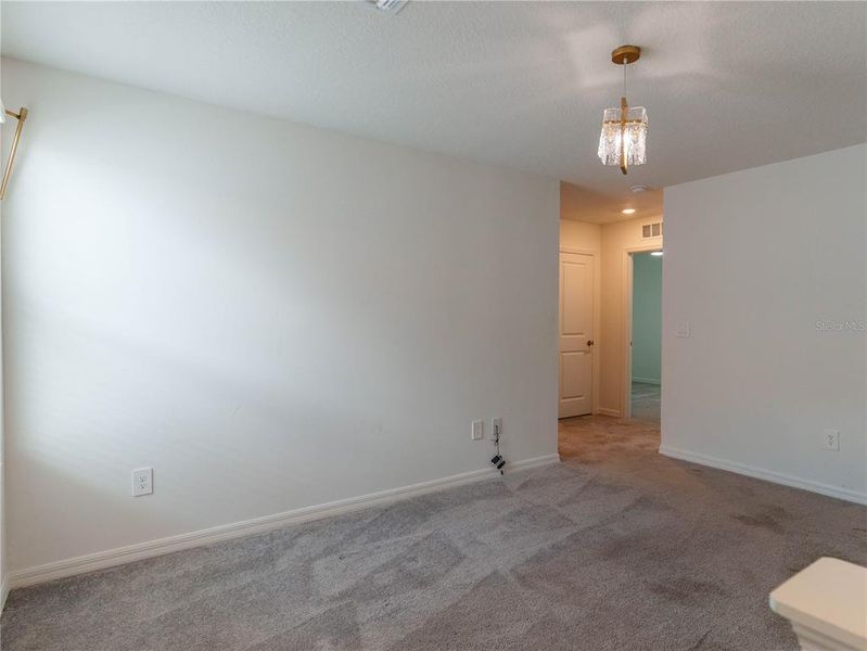 Spacious, unfurnished interior of a new home in The Isle of Avalon, Spring Hill (Image 19).