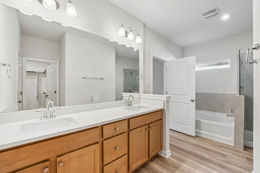 Furnished interior view inside a new home in Hills of Westwood, Temple (Image 9).