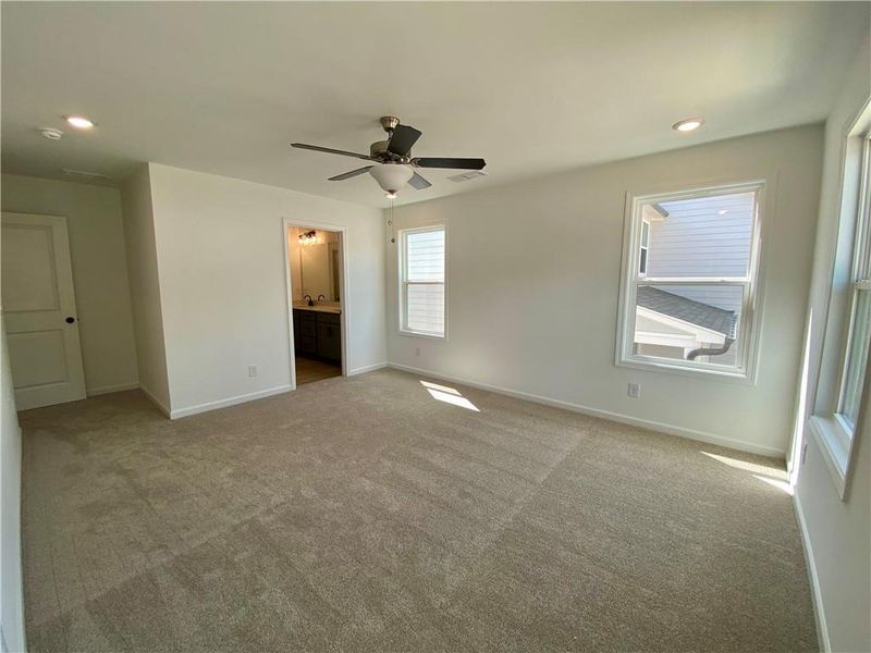 Spacious, unfurnished interior of a new home in Eastlyn Crossing, Flowery Branch (Image 23).