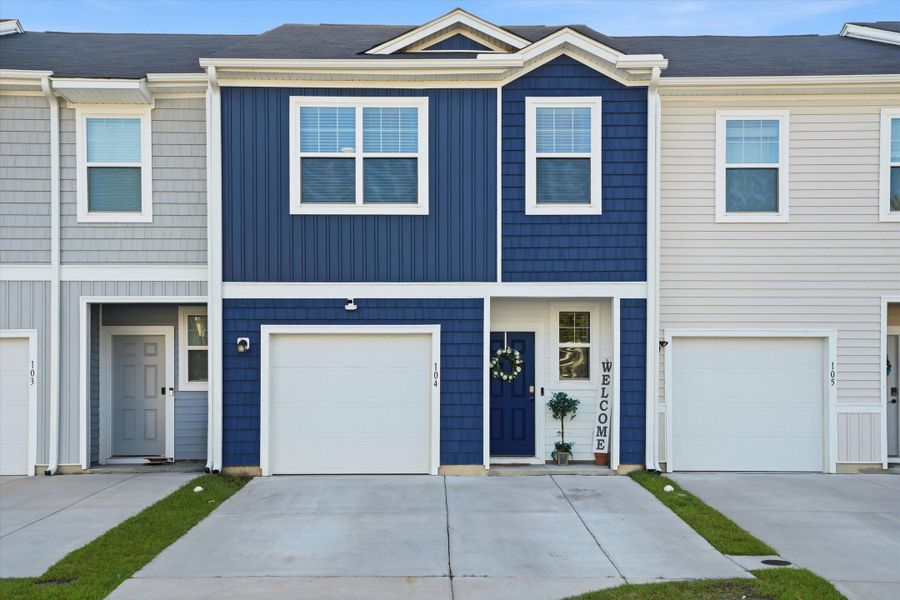 Front exterior of a new home in , Summerville, SC, highlighting curb appeal (Image 2). Front exterior of a new home in , Summerville, SC, highlighting curb appeal (Image 2).