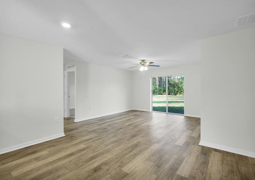 The family room is spacious and opens up easily to the dining room