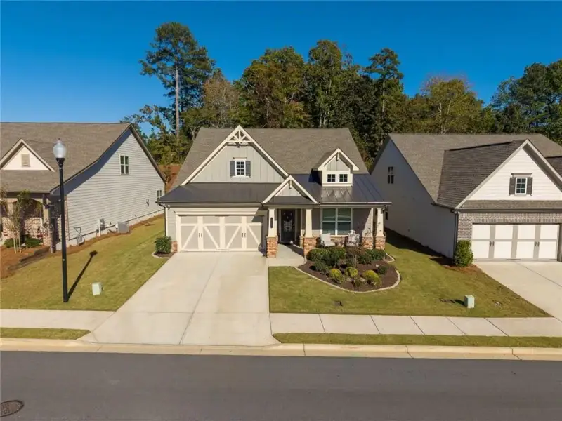 Front exterior of a new home in , Canton, GA, highlighting curb appeal (Image 26). Front exterior of a new home in , Canton, GA, highlighting curb appeal (Image 26).