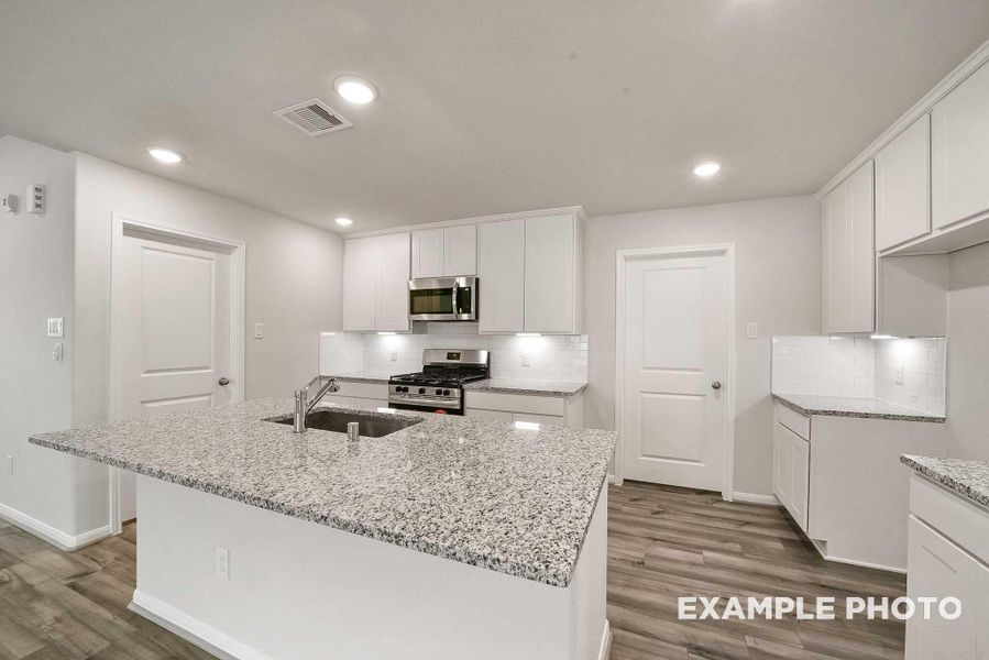 Furnished interior view inside a new home in Emberly, Beasley (Image 7).