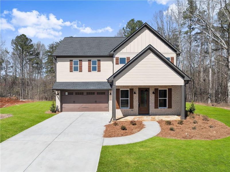 Front exterior of a new home in , Murrayville, GA, highlighting curb appeal (Image 1). Front exterior of a new home in , Murrayville, GA, highlighting curb appeal (Image 1).
