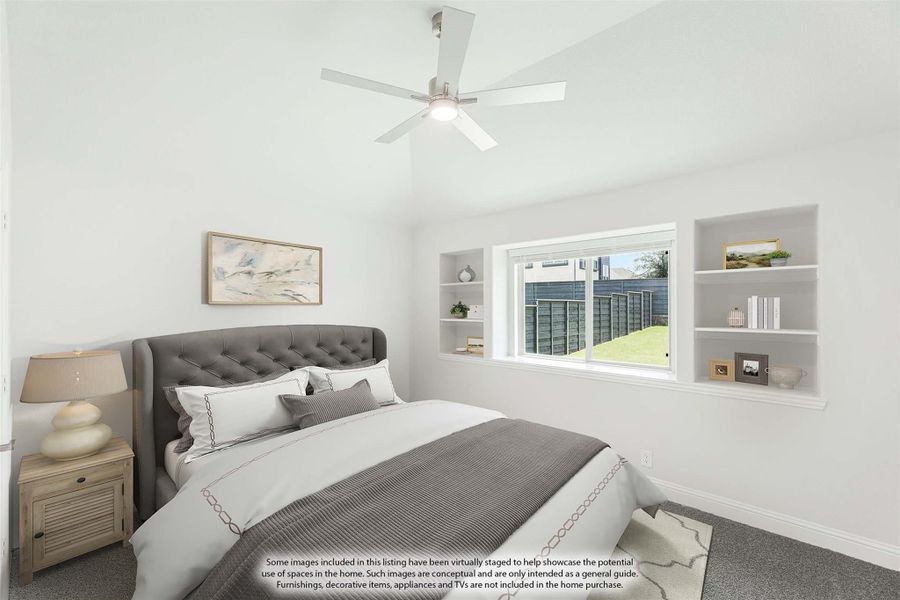 Bedroom with tufted gray headboard, built-in shelves, ceiling fan, and large window with backyard view Bedroom with tufted gray headboard, built-in shelves, ceiling fan, and large window with backyard view
