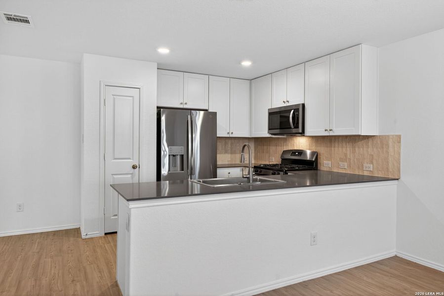 Furnished interior view inside a new home in Hidden Trails, Bulverde (Image 5).