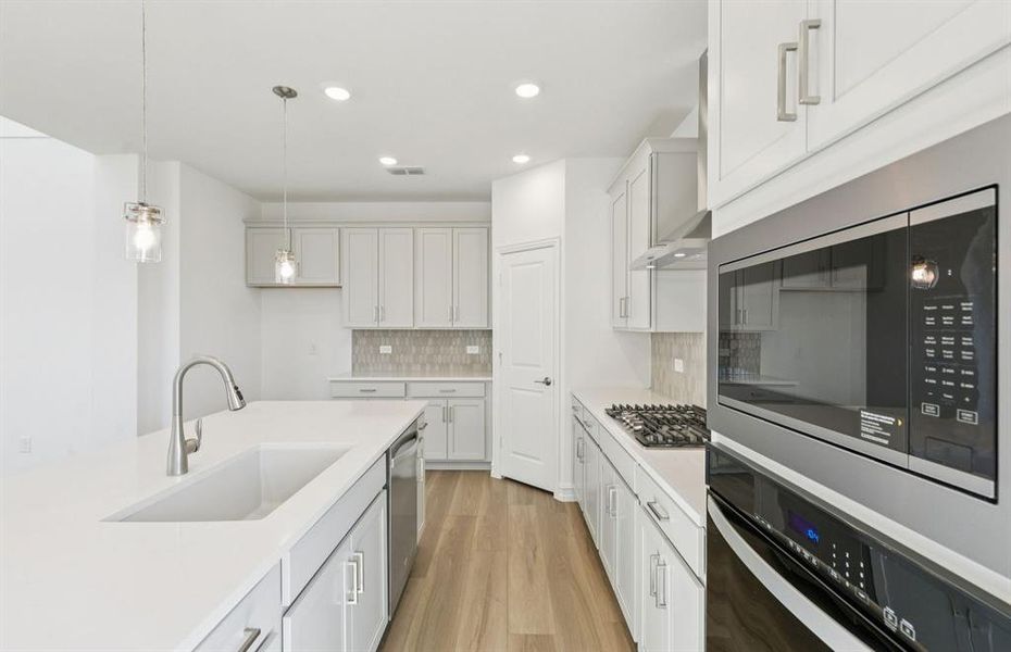 Abundant cabinet space in kitchen