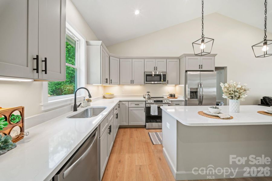Furnished interior view inside a new home in , Waynesville (Image 3).