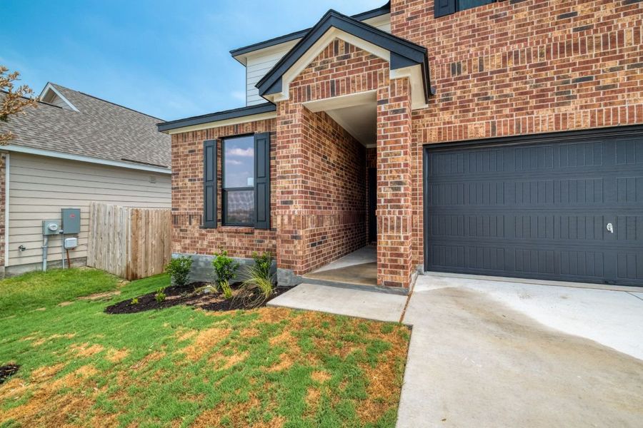 Exterior details and patio area of a home in Overlook Ranch, Georgetown (Image 3).