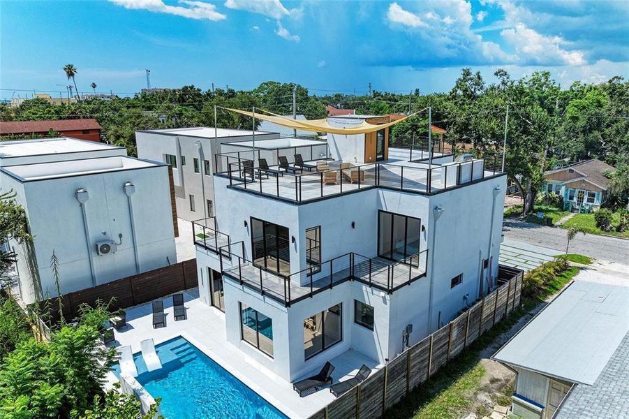 Front exterior of a new home in , Sarasota, FL, highlighting curb appeal (Image 26).