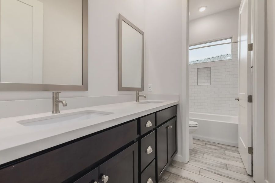 Furnished interior view inside a new home in Valencia at Granite Vista, Waddell (Image 10).