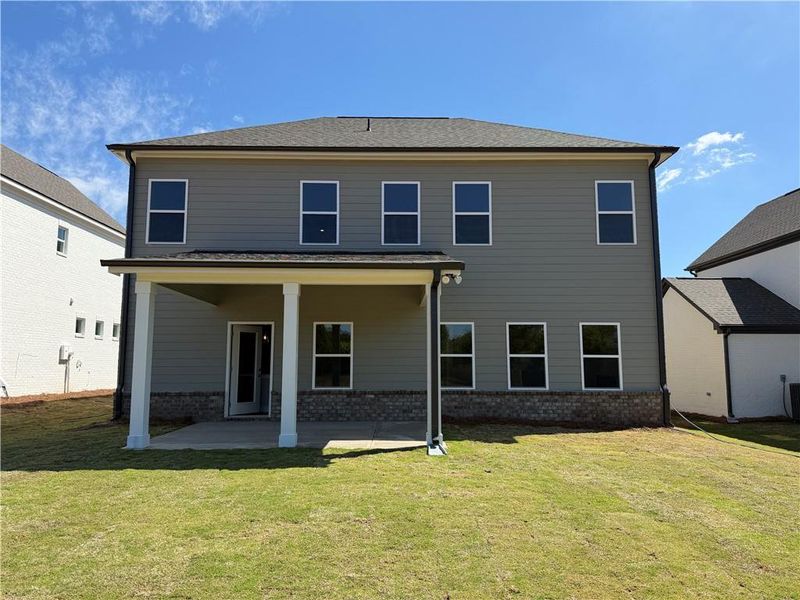 Exterior details and patio area of a home in Pinecrest Ridge, Dacula (Image 19).