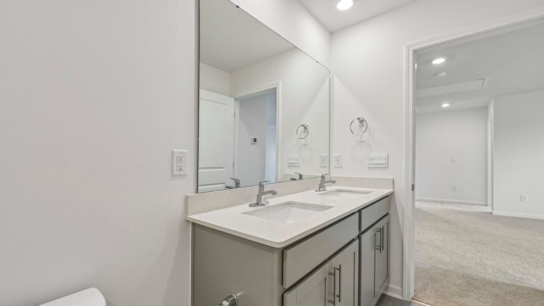 Furnished interior view inside a new home in Shahbain Reserve, Raeford (Image 8).