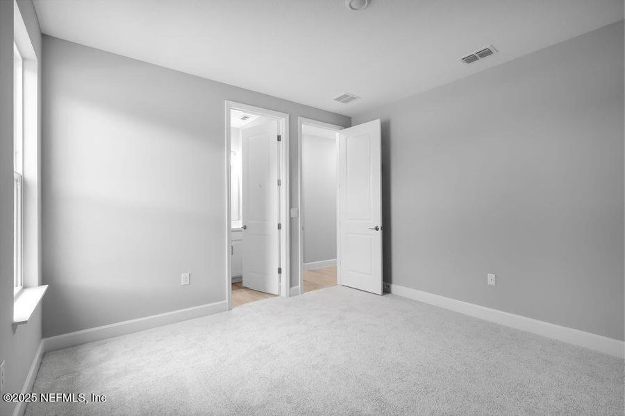 Spacious, unfurnished interior of a new home in Colbert Landings, Palm Coast (Image 24).