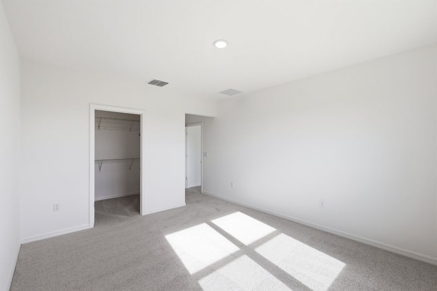 Spacious, unfurnished interior of a new home in Highfield at Twisted Oaks, Wildwood (Image 11).