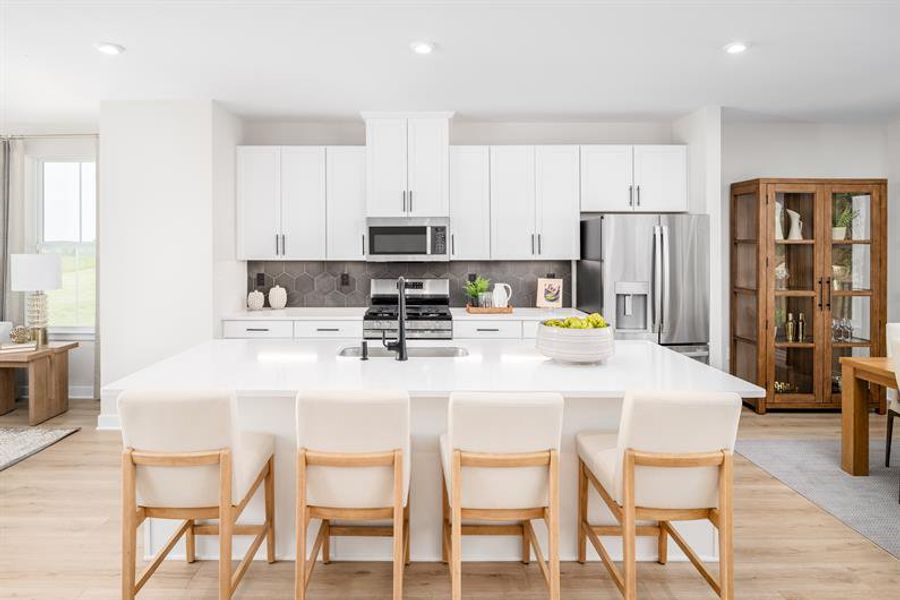 Representative furnished interior of a home built from the Sonata by Ryan Homes in Townes at The Station, Apex (Image 2). Representative furnished interior of a home built from the Sonata by Ryan Homes in Townes at The Station, Apex (Image 2).