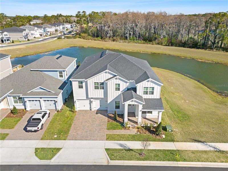 Front exterior of a new home in , Winter Garden, FL, highlighting curb appeal (Image 29).