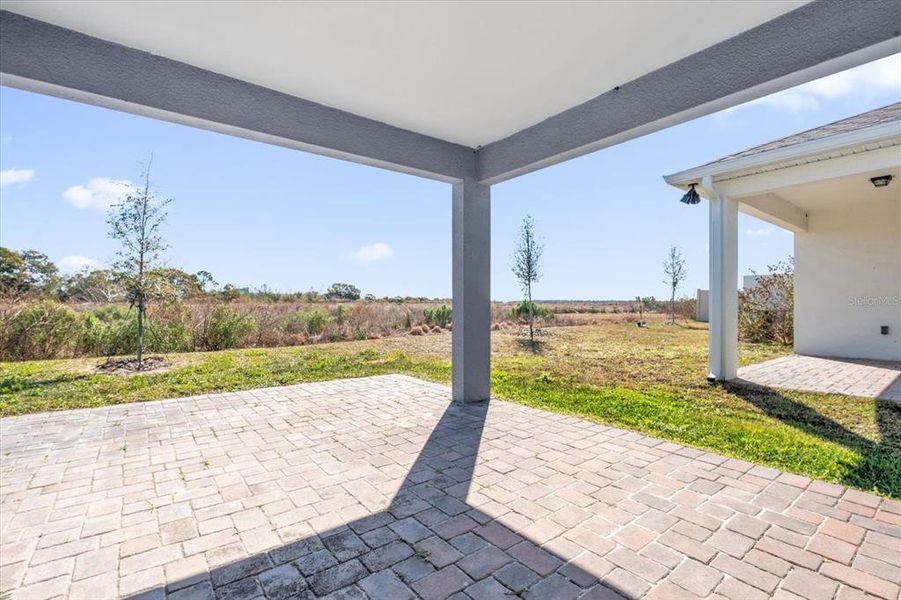 Exterior details and patio area of a home in Tohoqua Reserve, Kissimmee (Image 3).