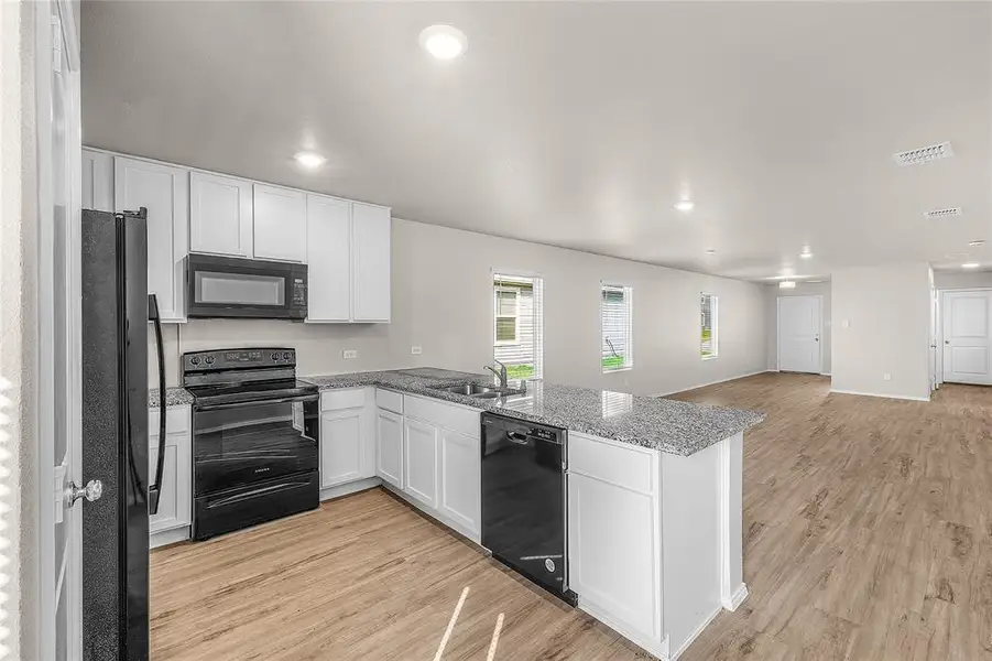 Furnished interior view inside a new home in , Fort Worth (Image 8).