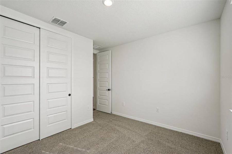 Spacious, unfurnished interior of a new home in Oakfield Trails - Signature Series, Parrish (Image 16).