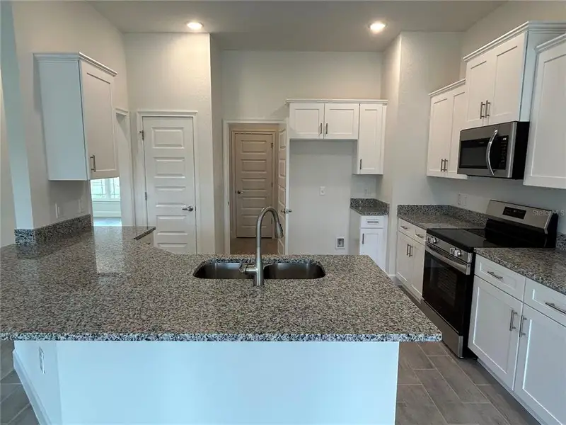 Furnished interior view inside a new home in Watercress Cove, North Port (Image 4). Furnished interior view inside a new home in Watercress Cove, North Port (Image 4).