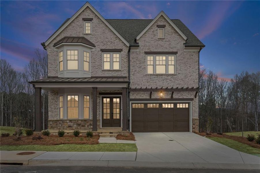 Front exterior of a new home in Laurel View, Suwanee, GA, highlighting curb appeal (Image 26). Front exterior of a new home in Laurel View, Suwanee, GA, highlighting curb appeal (Image 26).