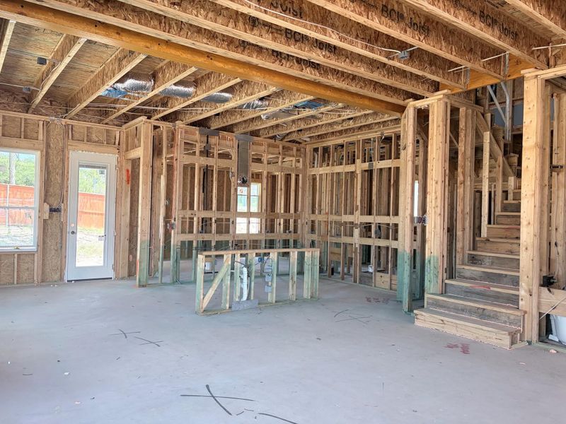 Framed interior with exposed structural elements awaits final customization. Framed interior with exposed structural elements awaits final customization.