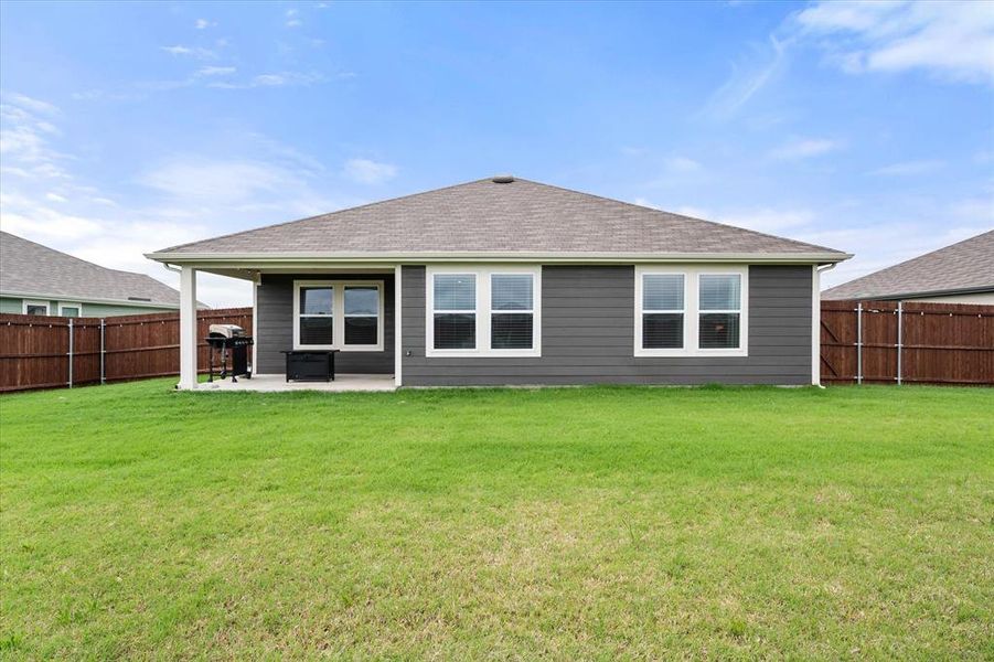 Exterior details and patio area of a home in Corsicana Commons, Corsicana (Image 22).