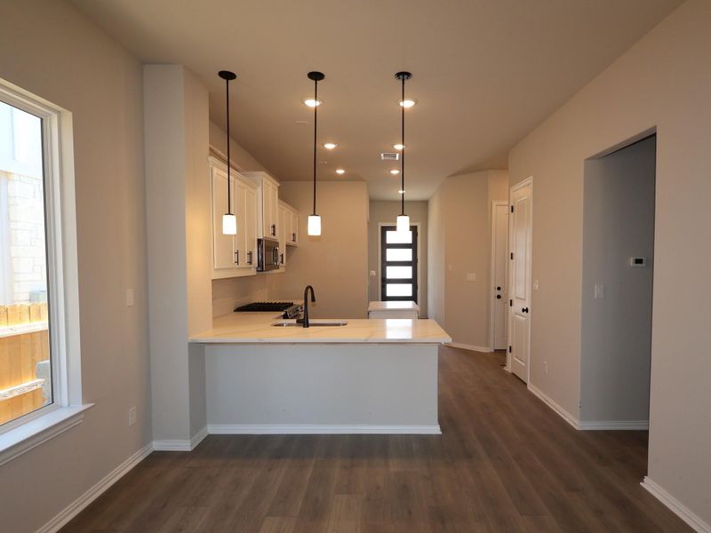 Furnished interior view inside a new home in Heritage, Dripping Springs (Image 12).