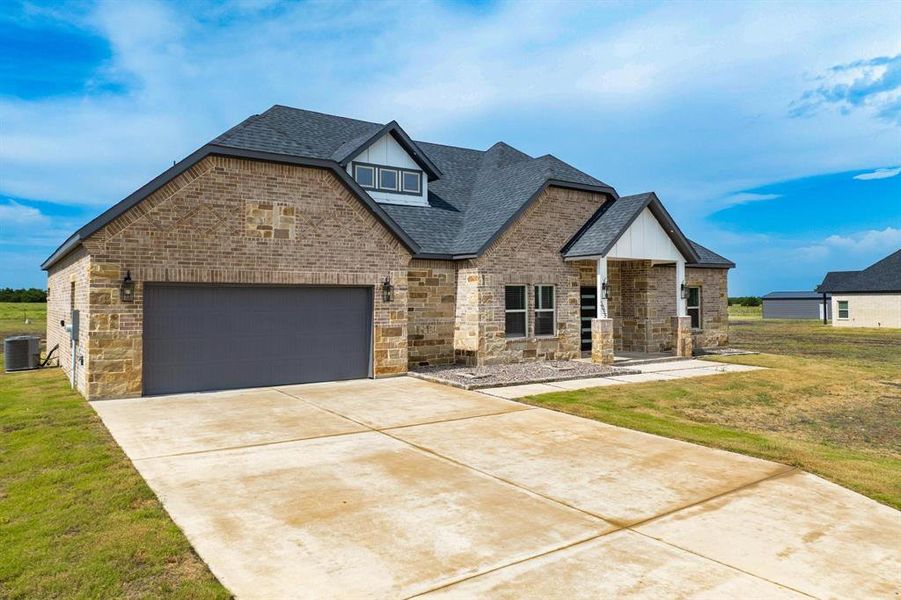 Front exterior of a new home in , Greenville, TX, highlighting curb appeal (Image 22).