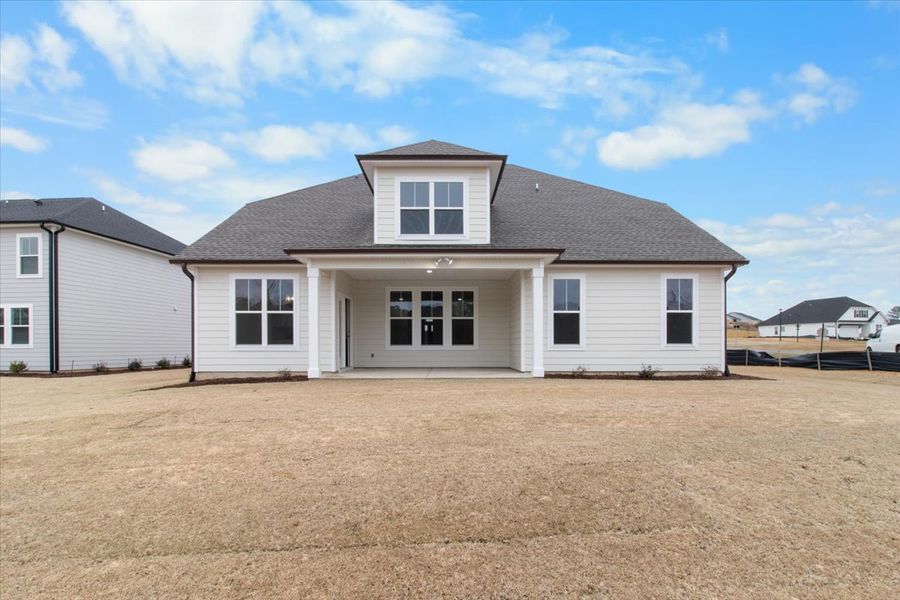 Backyard & Covered Patio | 915 Lillian Park Drive, The Nottaway Plan by Ivey Homes