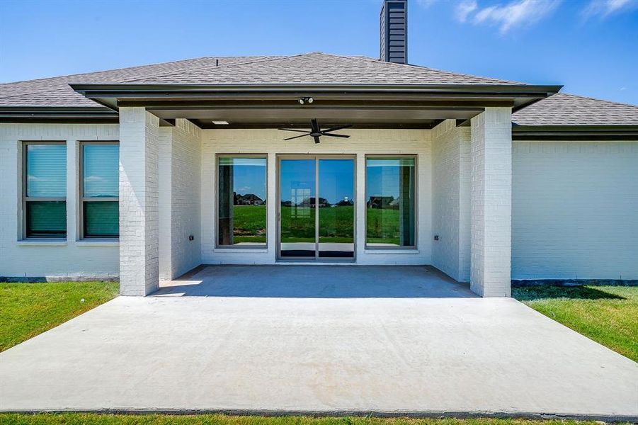 Exterior details and patio area of a home in Matthews Farm, Venus (Image 3).