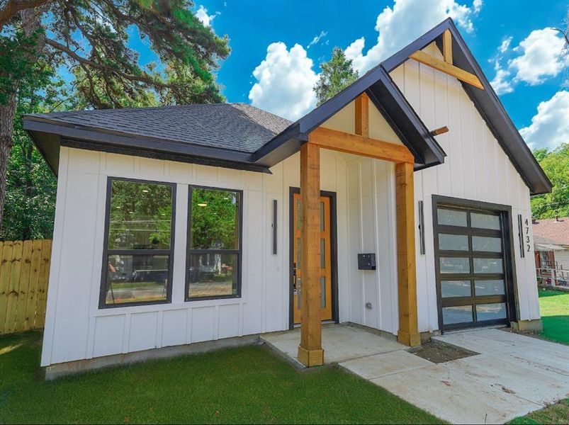 Front exterior of a new home in , Dallas, TX, highlighting curb appeal (Image 22).