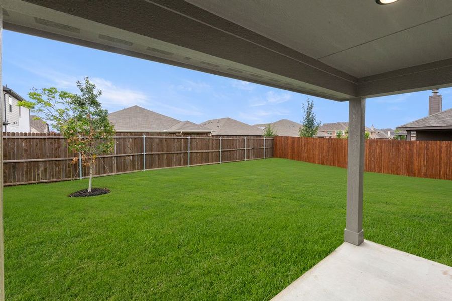 Representative exterior photo of a completed home built from the Lincoln by Impression Homes in DeBerry Reserve, Royse City, TX (Image 25).