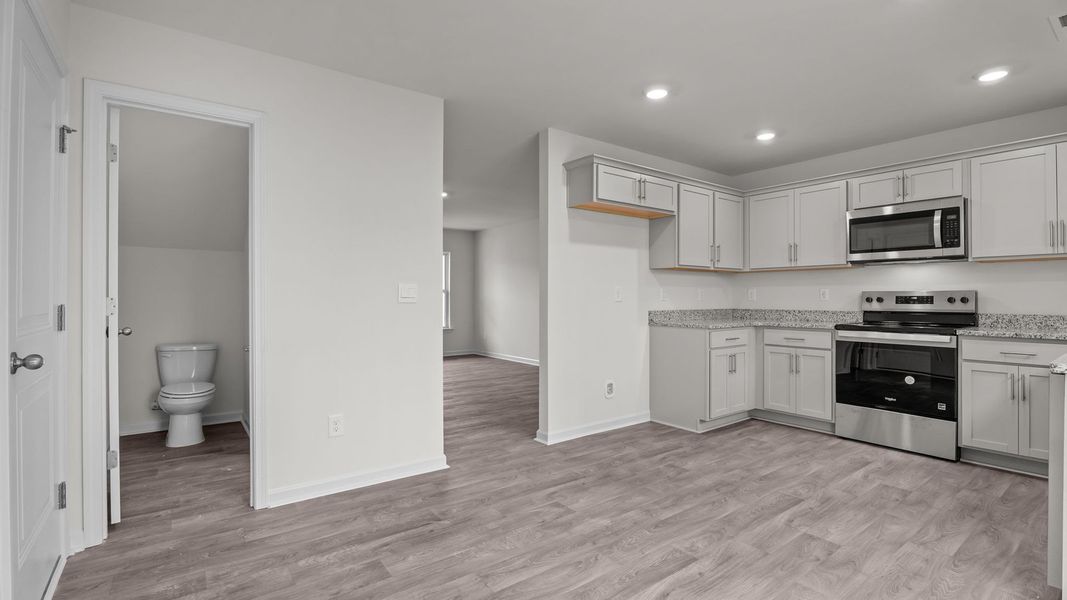 Representative furnished interior of a home built from the Rachel by D.R. Horton in Hobbs Farm, Ayden (Image 8).