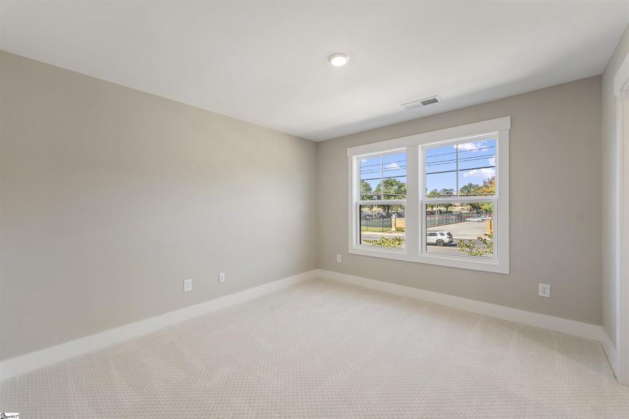 Spacious, unfurnished interior of a new home in Renaissance Place, Greenville (Image 12).
