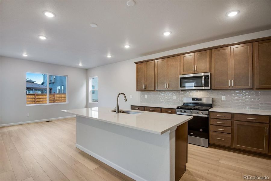 Furnished interior view inside a new home in Medley at Reunion Ridge, Commerce City (Image 9).