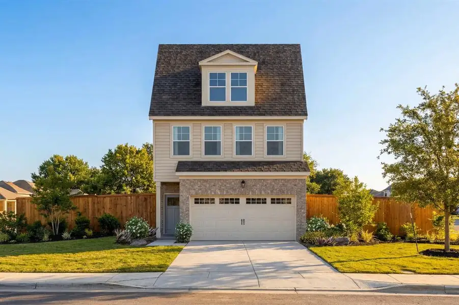 Front exterior of a new home in Lake Park Villas, Wylie, TX, highlighting curb appeal (Image 1). Front exterior of a new home in Lake Park Villas, Wylie, TX, highlighting curb appeal (Image 1).