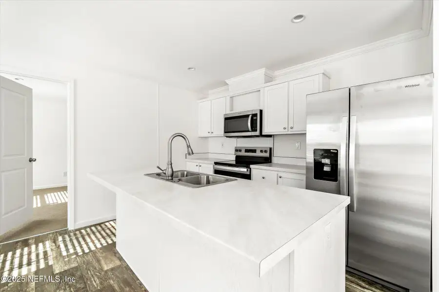 Furnished interior view inside a new home in , East Palatka (Image 3). Furnished interior view inside a new home in , East Palatka (Image 3).