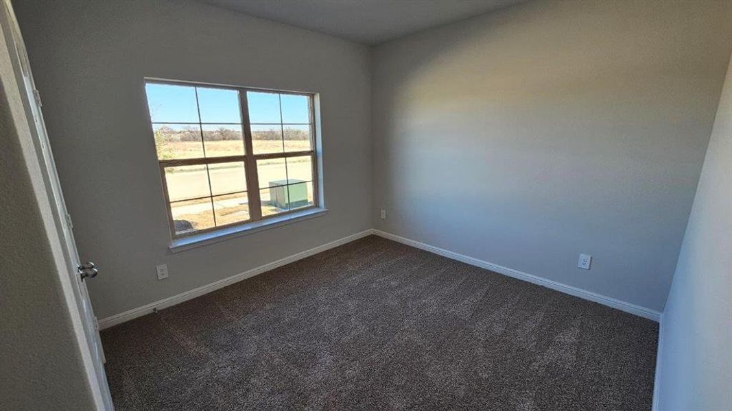 Spacious, unfurnished interior of a new home in Monarch at the Meadows, Ponder (Image 10).