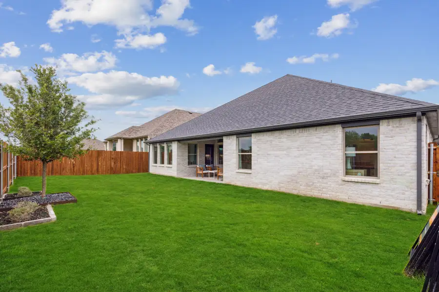 Patio in the Gilmour home plan by Trophy Signature Homes – REPRESENTATIVE PHOTO