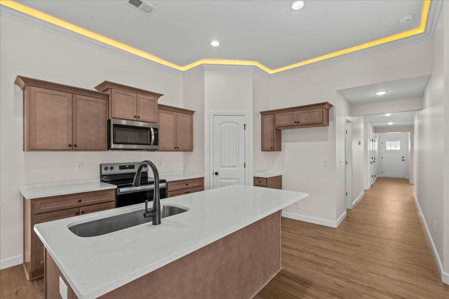 Representative furnished interior of a home built from the Cheshire by Enchanted Homes in Hampshire Heights, Moore (Image 6).