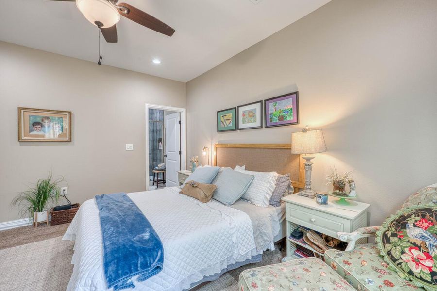 Recessed lighting, ceiling fan, and carpeted flooring