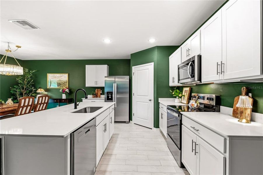 Furnished interior view inside a new home in Burnt Store Village, Punta Gorda (Image 22).