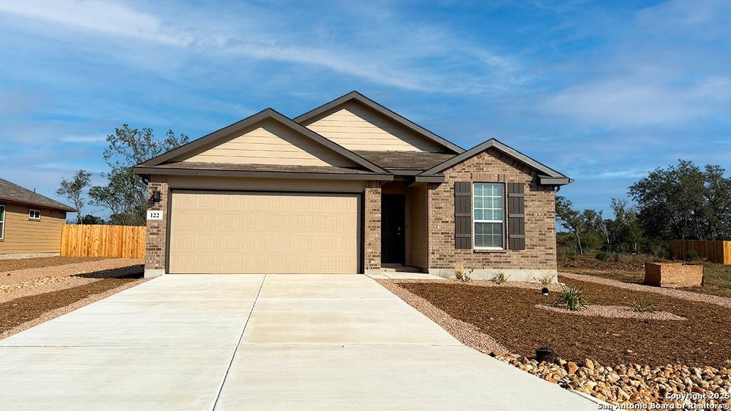 Front exterior of a new home in High Garden, Comfort, TX, highlighting curb appeal (Image 2). Front exterior of a new home in High Garden, Comfort, TX, highlighting curb appeal (Image 2).